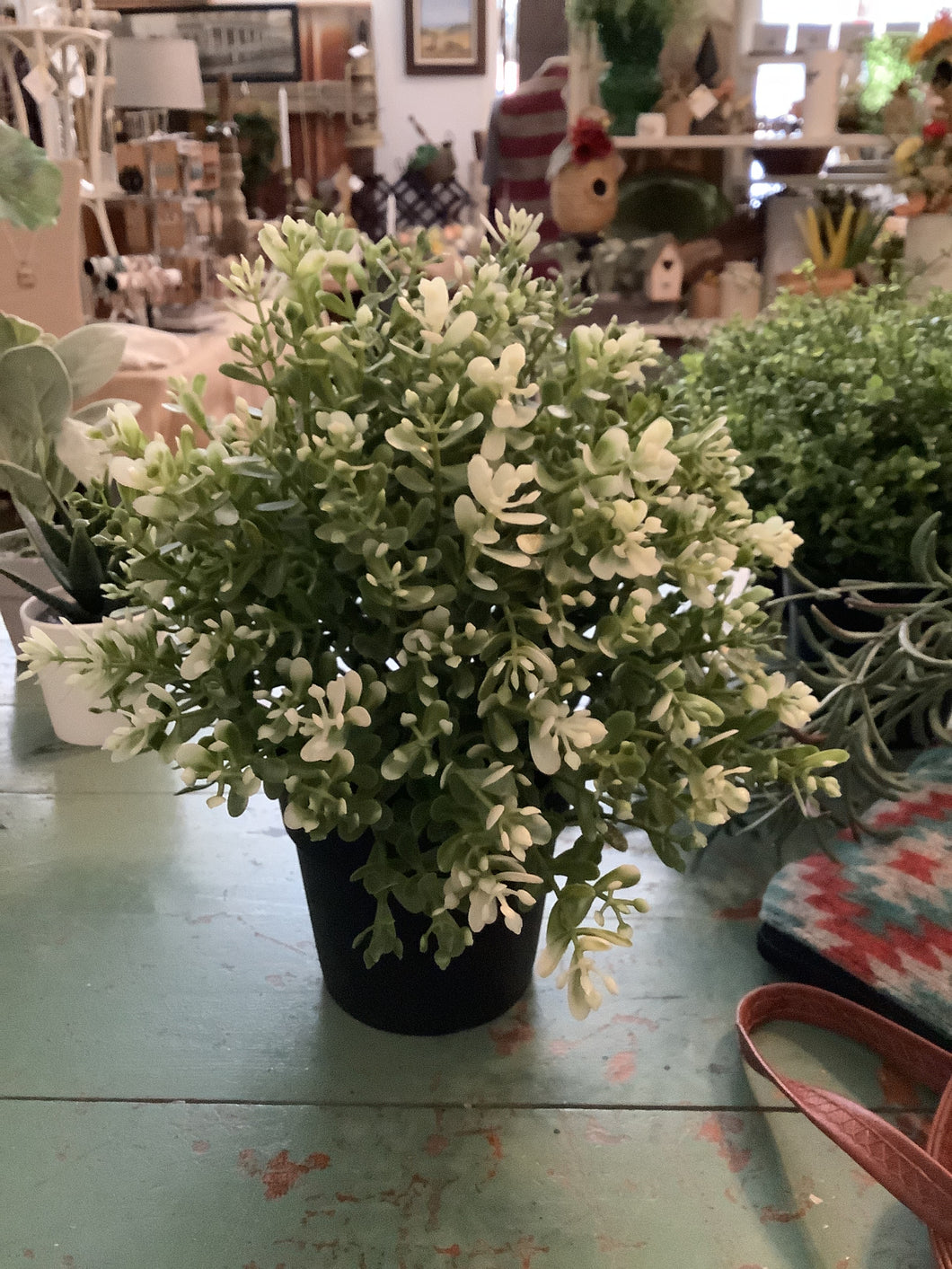 Faux potted greenery